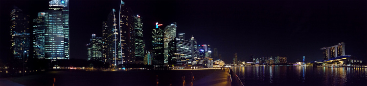 A night-time panorama of the Singapore skyline by the waterfront